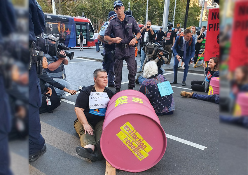 Climate rebels arrested after blocking CBD street