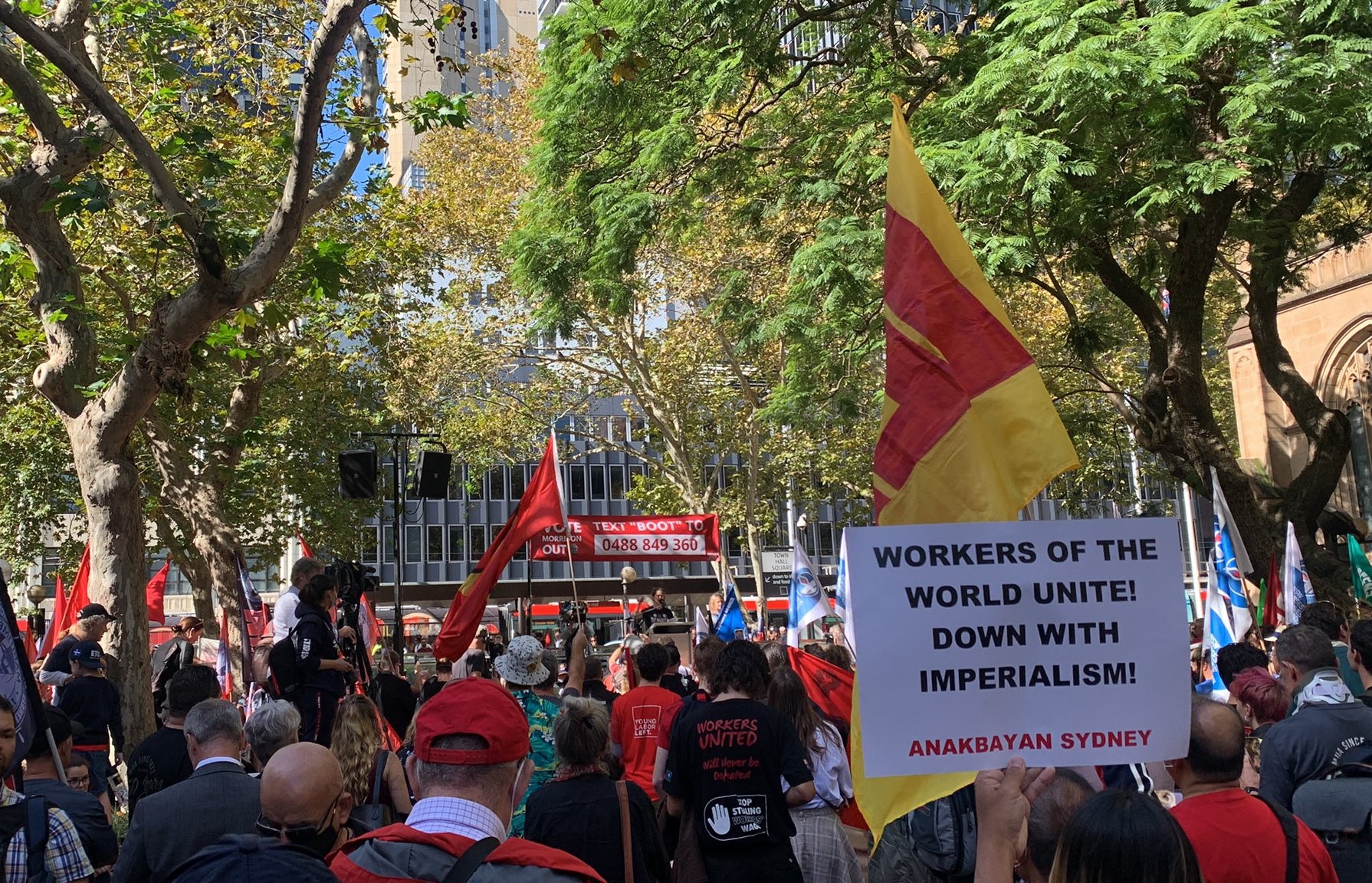Crowds gather at Town Hall for May Day march